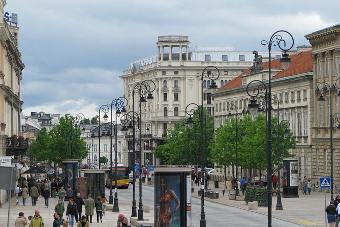 Faces of Warsaw's 3-hour orientation city tour with hotel pick-up - Grzybowski Square: A Short Stop With Heavy Weight