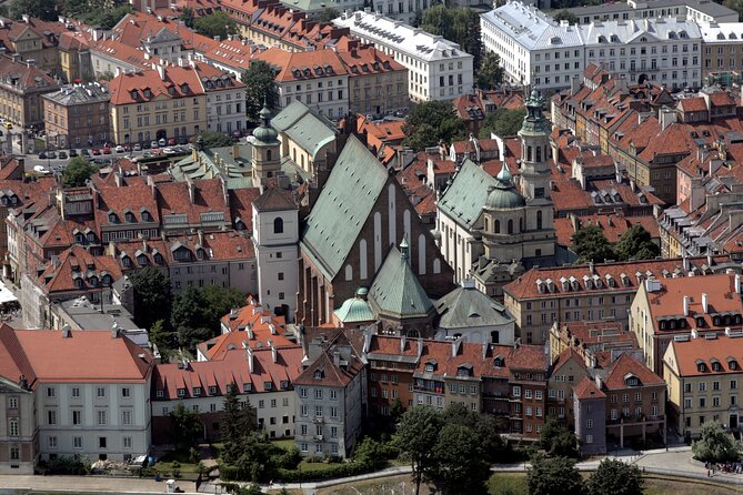 Half-Day Warsaw Layover Tour by Minivan with Airport Pickup - National Stadium and the story clues about communism