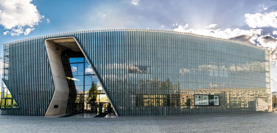Warsaw: City Highlights Tour with hotel Pick up /Drop Off - Praga District optional add-on: National Stadium to Dąbrowski Bridge views