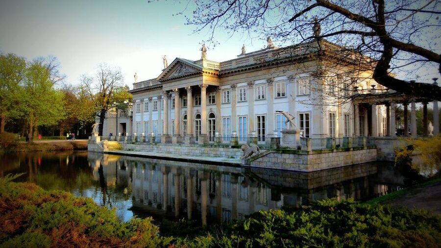 Warsaw: Old Town Highlights Private Walking Tour - Royal Castle with skip-the-line tickets: portraits, apartments, and scars