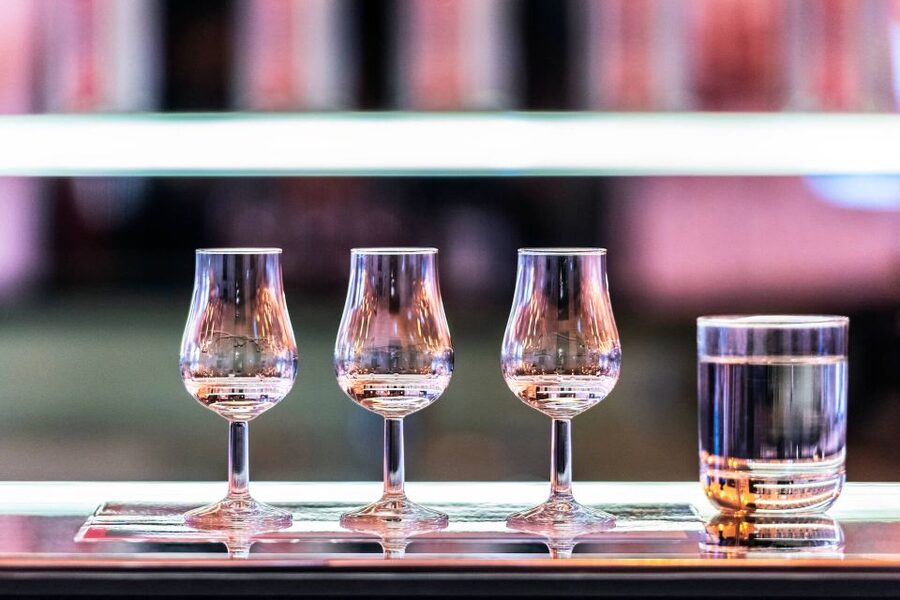 Warsaw: Praga District Tour with Vodka Museum and Tasting - Praga feels real, not staged, with shrines and backstreet walking