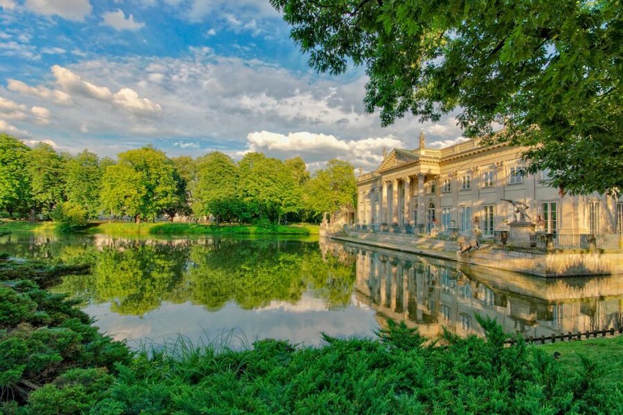 Warsaw: Warsaw Historical Group Tour with Pickup & Drop-Off - Hotel pickup, bus comfort, and how the Royal Route sets the tone