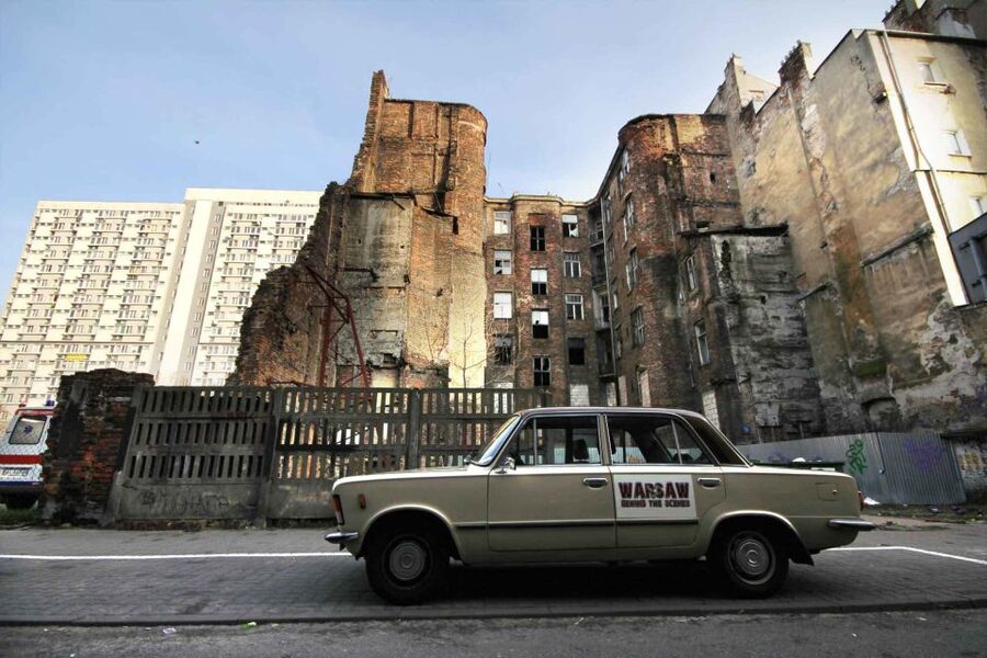 Warsaw: WWII Private Tour by Retro Minibus with Hotel Pickup - Muranów: Reading the City Built From Wartime Rubble